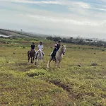 Апартаменты Bed&ride La Manigua *